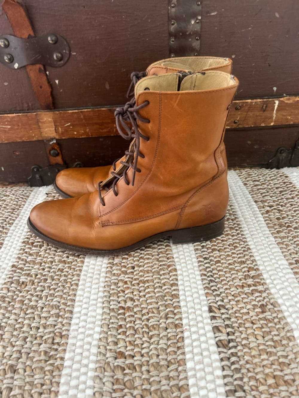 Frye woman’s lace up boots